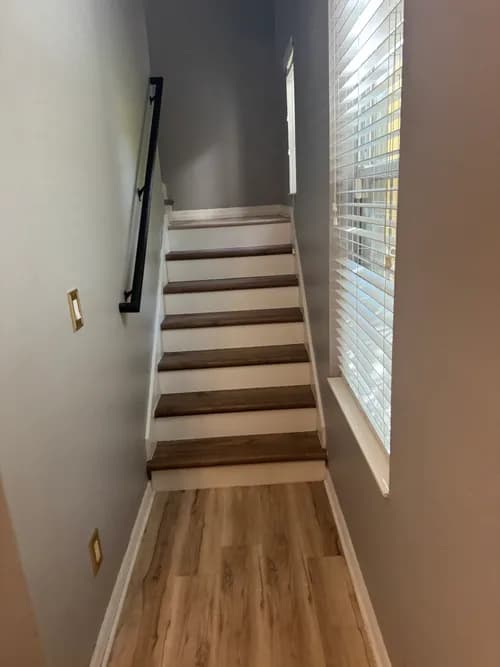 Two Maids Cleaning - Photo 2